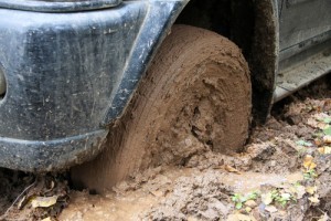 car-in-the-mud-shutterstock_137357741-300x200