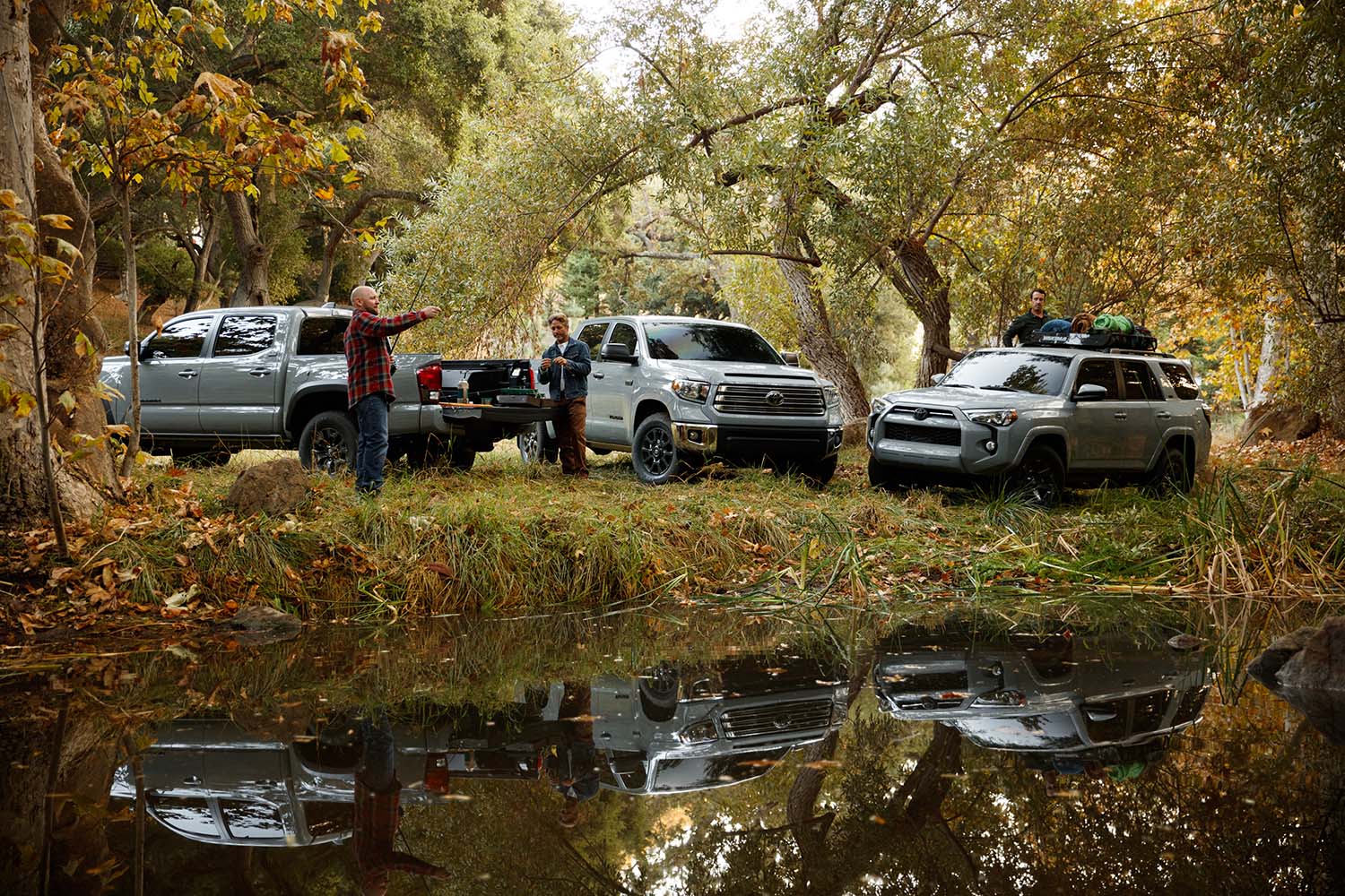 Accessories that help keep your Toyota protected at Bennett Toyota in Allentown, PA | 2021 Toyota Tundra, Tacoma, and 4Runner parked in the woods