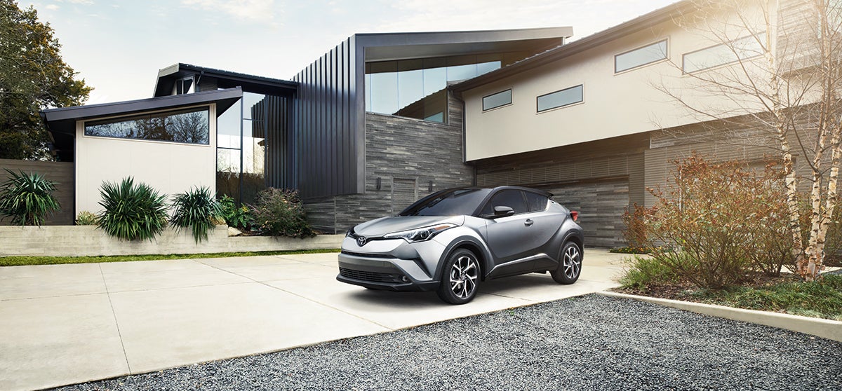 Bennett Toyota of Allentown is a Car Dealership near Catasauqua, PA | 2021 Toyota CHR parked in driveway