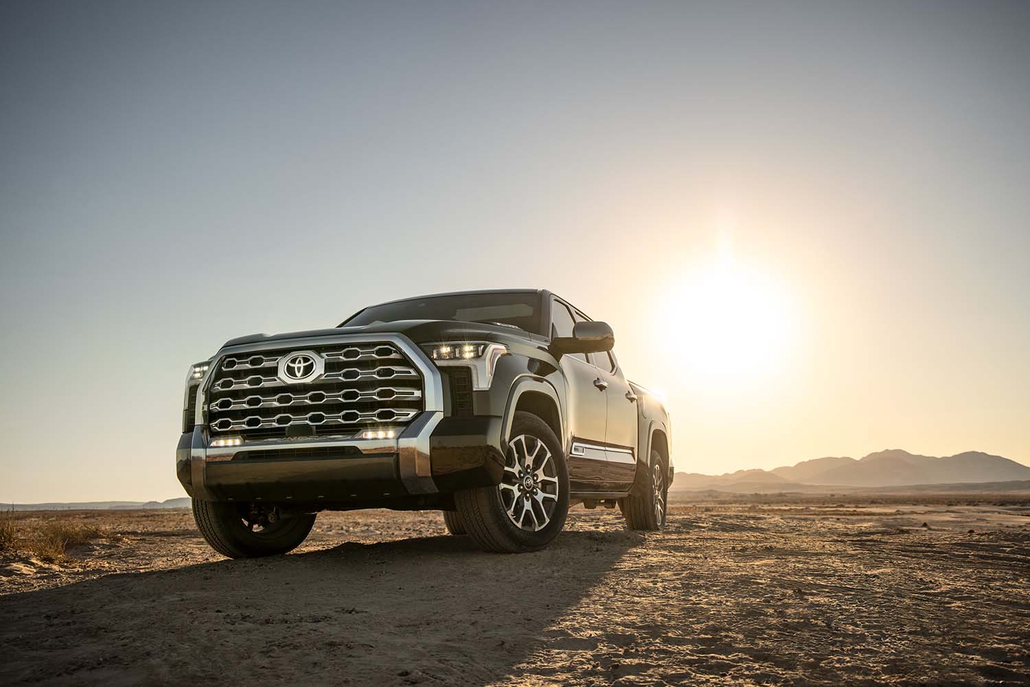 Toyota Hybrid for Everyone at Bennett Toyota | 2022 Toyota Tundra Hybrid parked in desert at sunset