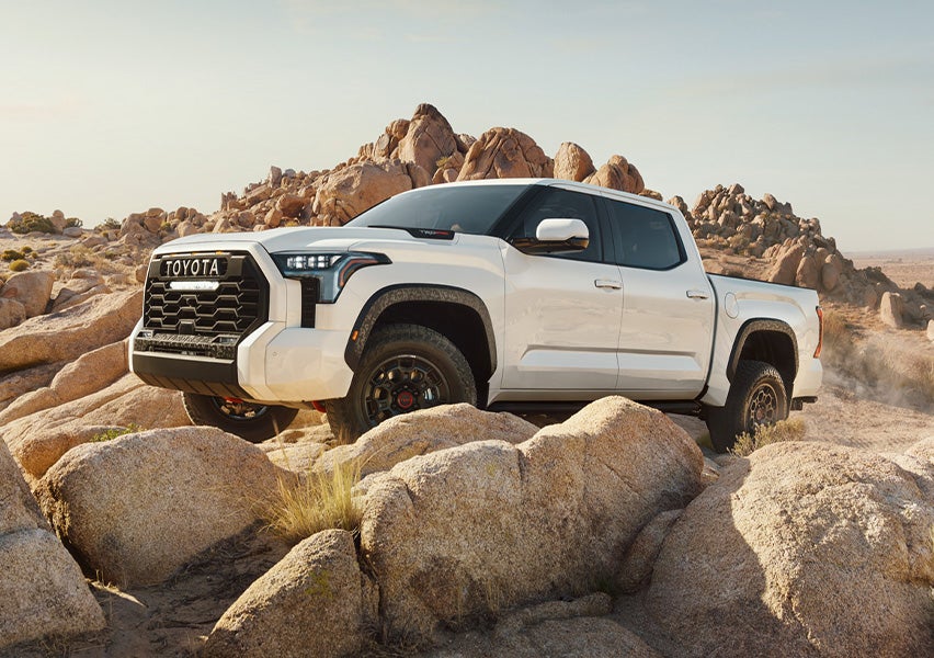 The All-New 2022 Toyota Tundra at Bennett Toyota in Allentown | White 2022 Toyota Tundra Off-Roading on Rocky Hill