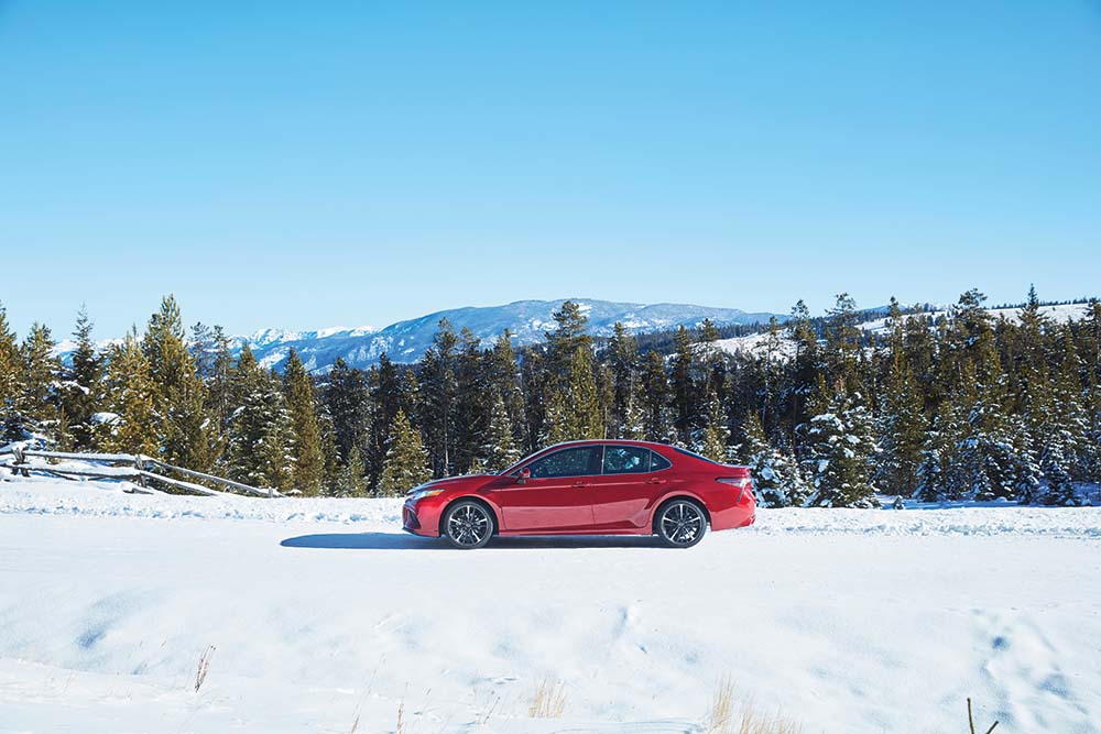 Winter Tires vs. All Season Tires at Bennett Toyota in Allentown, PA | 2021 Toyota Camry driving on a snowy road