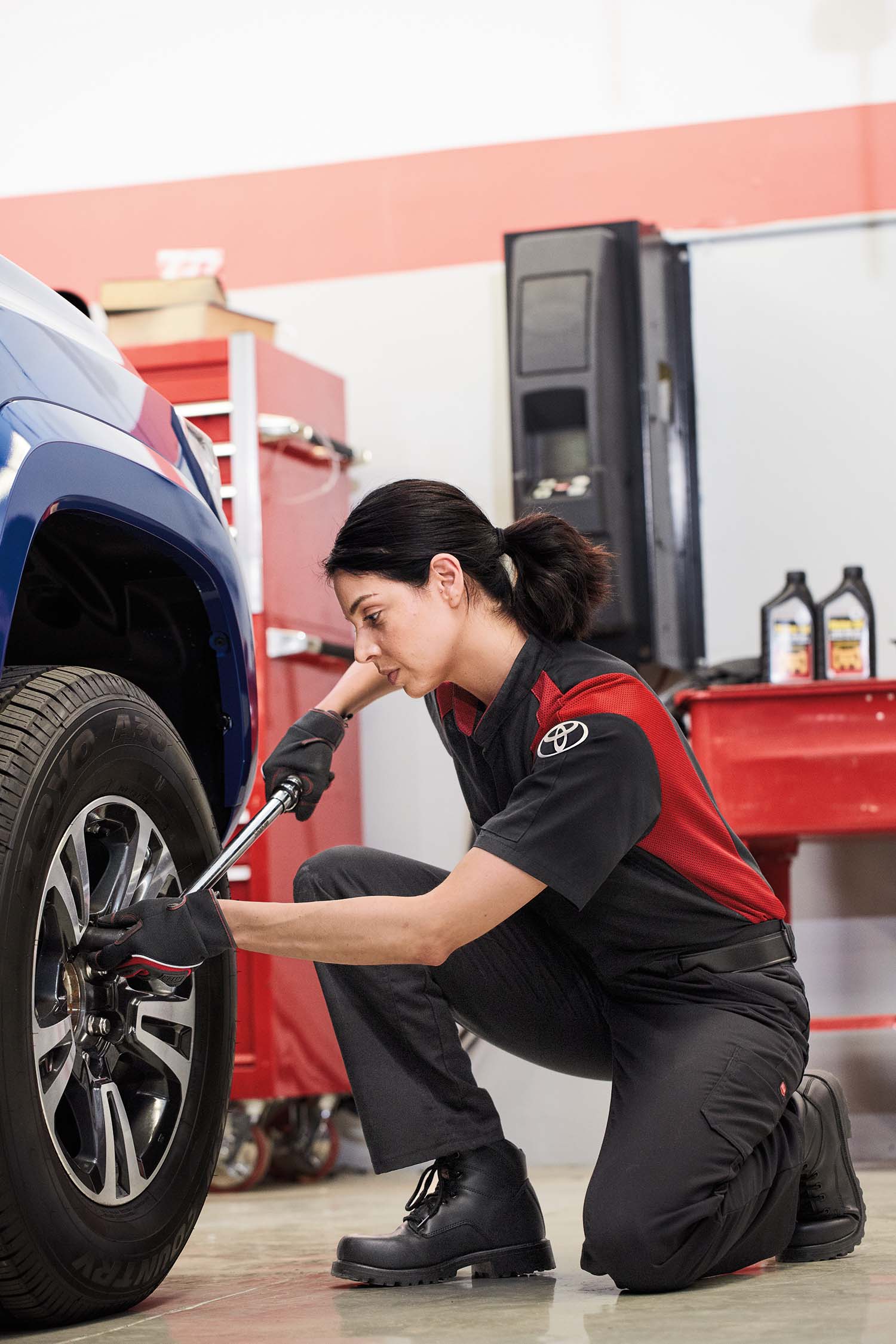 The Cold Facts of Winter Tires | Bennett Toyota in Allentown, PA | Toyota service technician changing tires on a Toyota Tacoma
