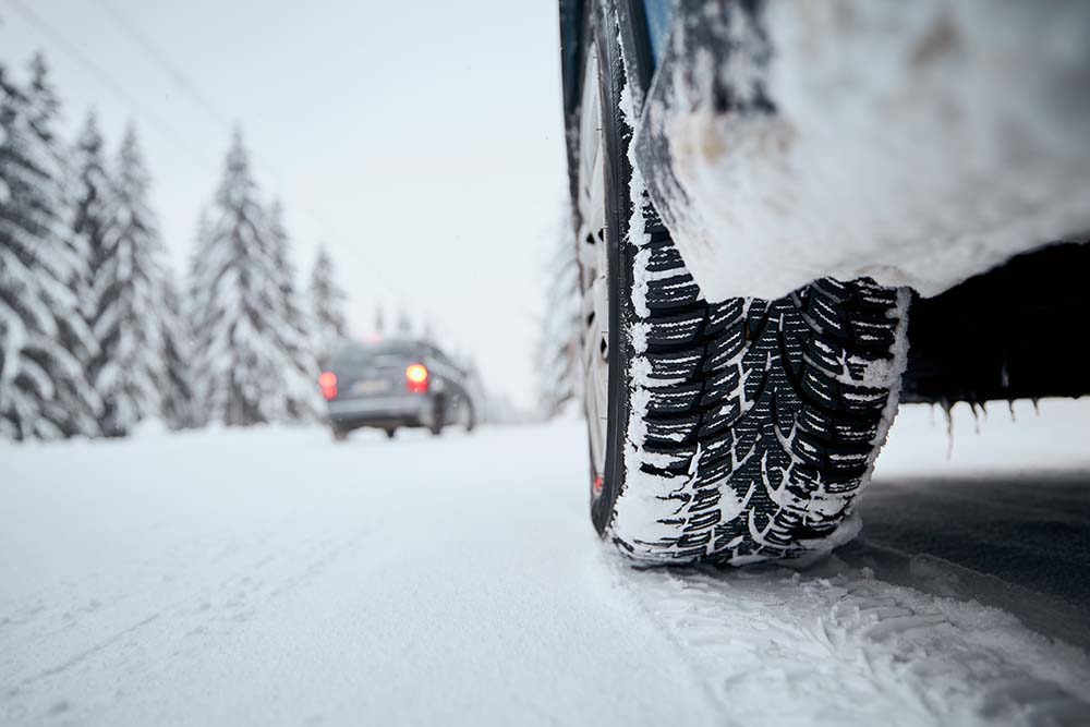 Winter Tires vs. All Season Tires at Bennett Toyota in Allentown, PA | Vehicle equipped with winter tires driving in the snow